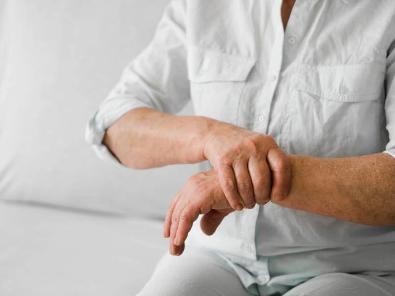 Patient experiencing pinched nerve pain in the wrist receiving care at Magnet Health NY, located at 907 E Tremont Ave, Bronx, NY 10460