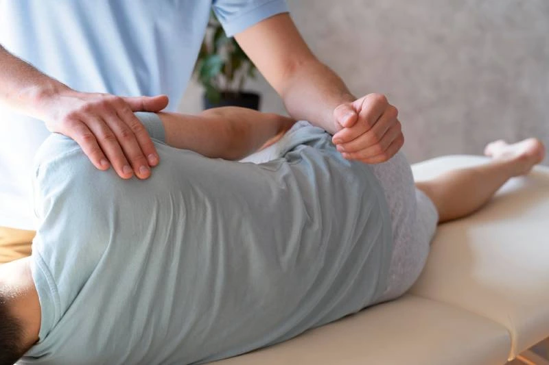 Sciatica nerve pain treatment with manual therapy at Magnet Health NY, located at 907 E Tremont Ave, Bronx, NY 10460