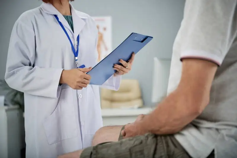 Internal medicine doctor consulting with a patient at Magnet Health NY, offering preventive care at 907 E Tremont Ave and 741 E 233rd St, Bronx, NY
