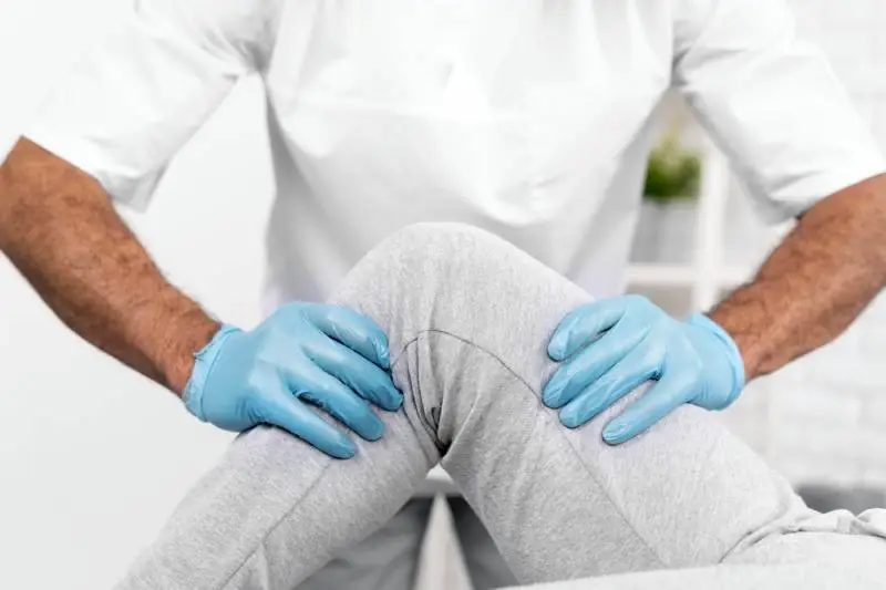 Knee pain specialist providing treatment for joint issues at Magnet Health NY, located at 907 E Tremont Ave and 741 E 233rd St, Bronx, NY